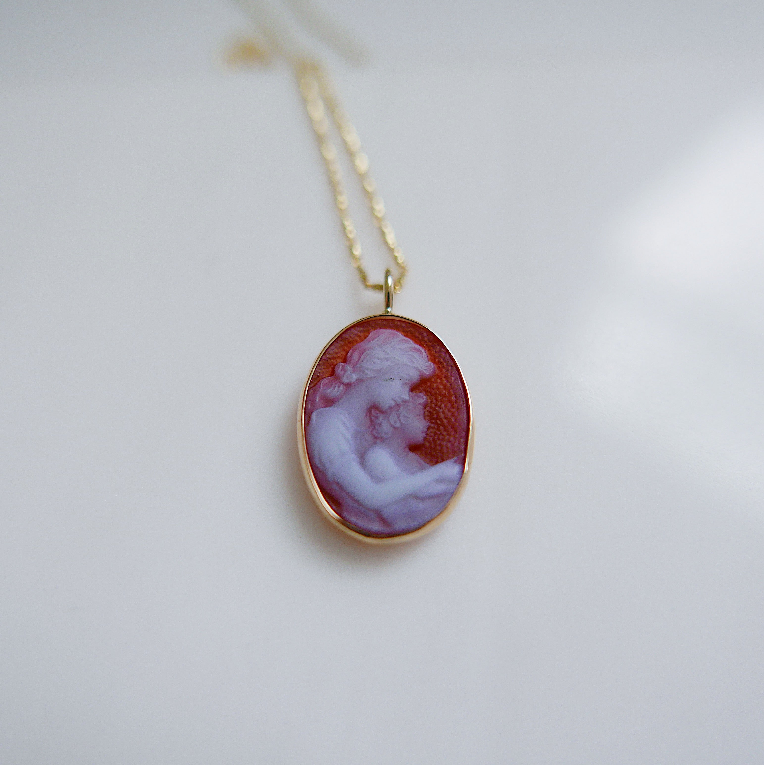 Orange Agate Mother and Child Pendant