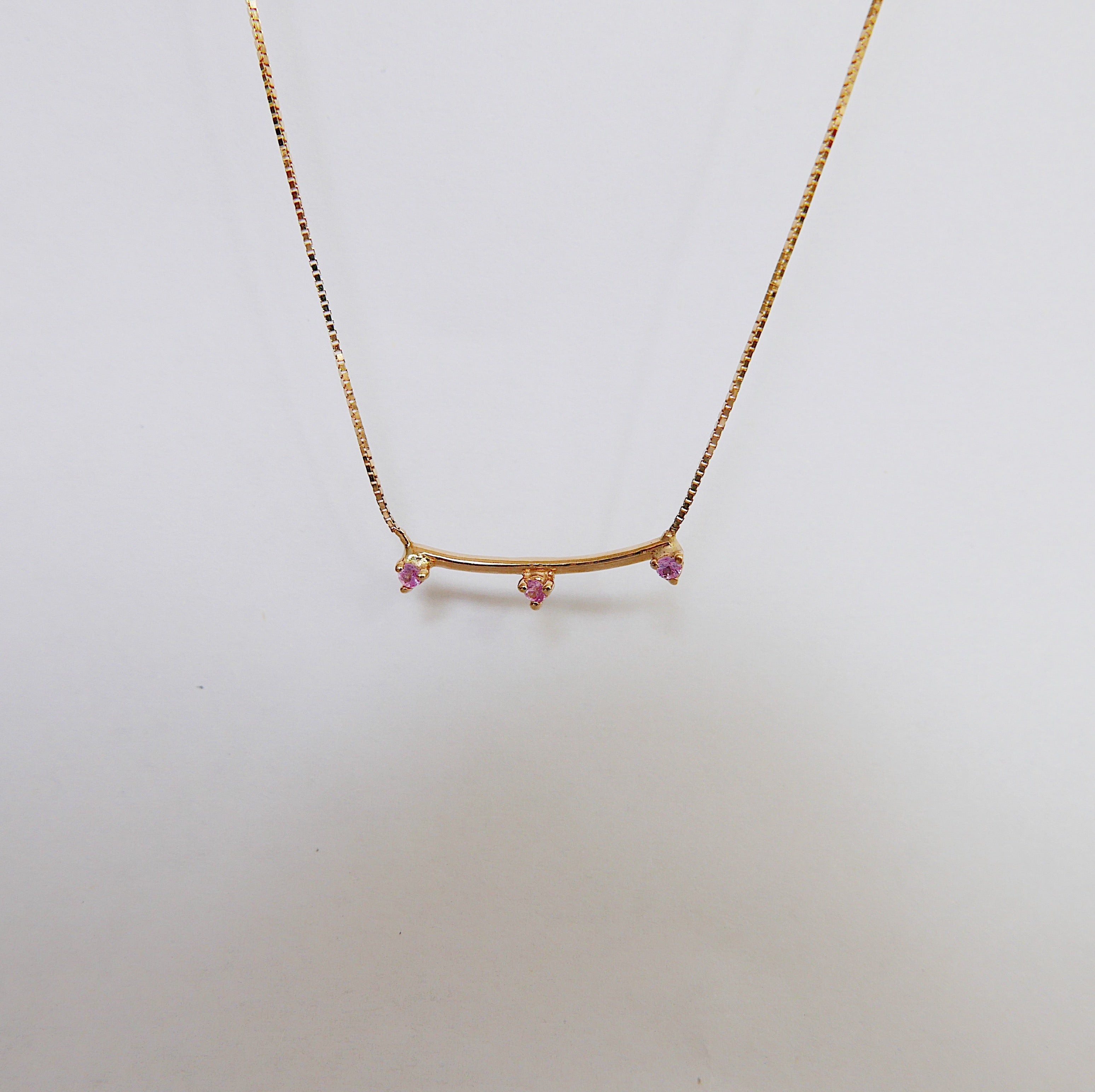 Simple staple everyday necklace with a pop of color.  Normally $580  Details: Pink Sapphires measures about 1.7mm Total necklace length is 16.75 inches  14k Yellow Gold  Free Shipping on Domestic Orders over $50  Materials: 14 yellow gold