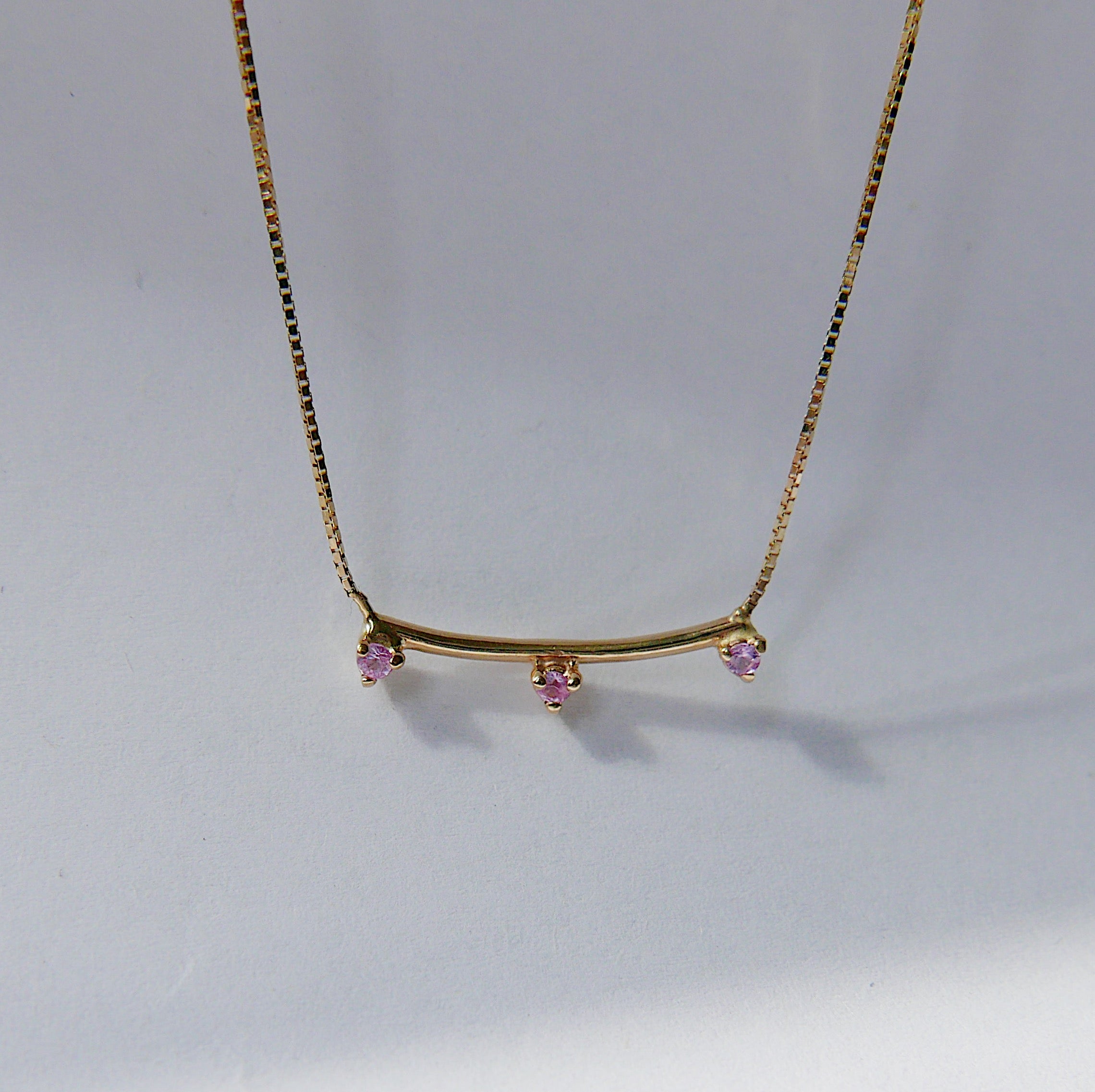 Simple staple everyday necklace with a pop of color.  Normally $580  Details: Pink Sapphires measures about 1.7mm Total necklace length is 16.75 inches  14k Yellow Gold  Free Shipping on Domestic Orders over $50  Materials: 14 yellow gold