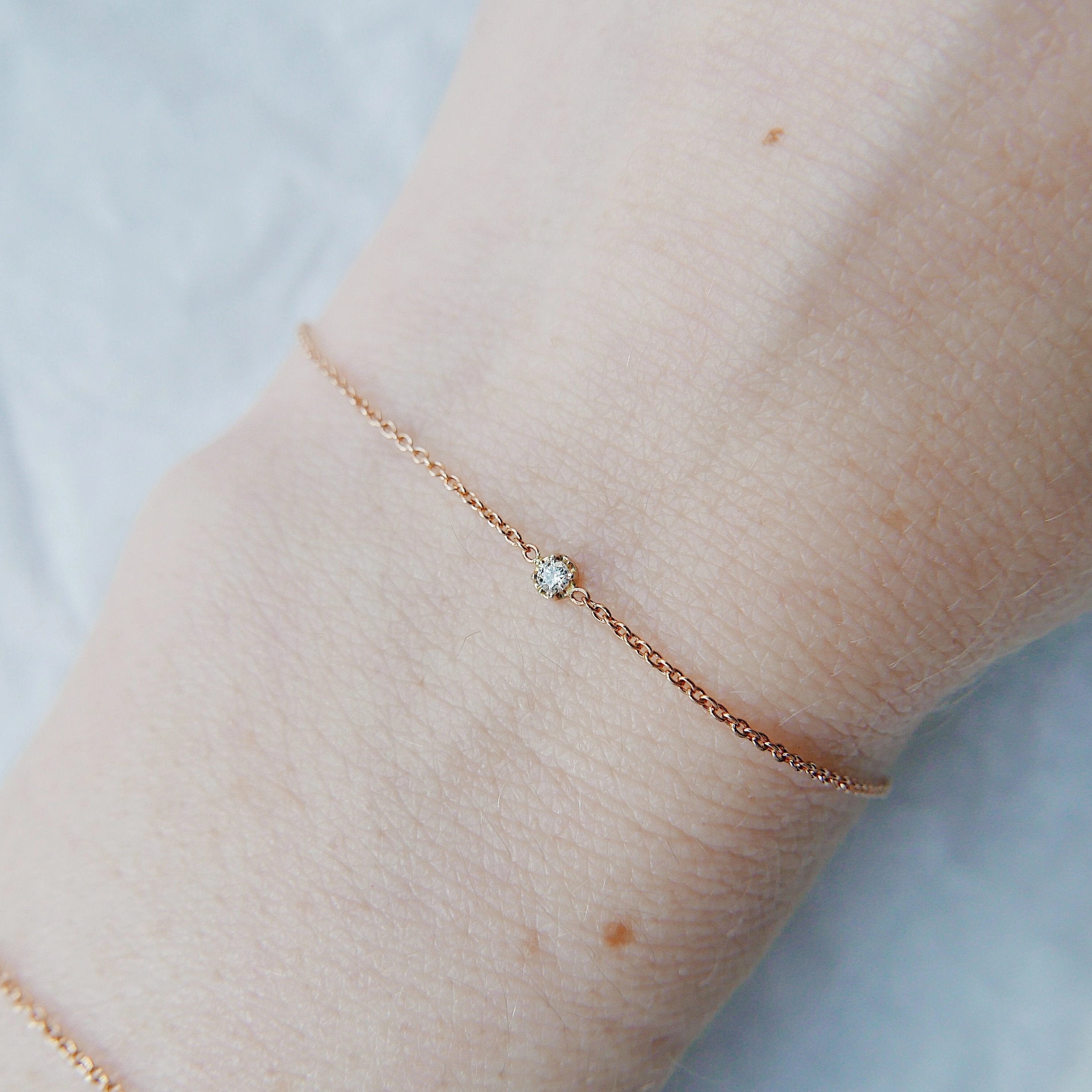 14k single diamond bracelet