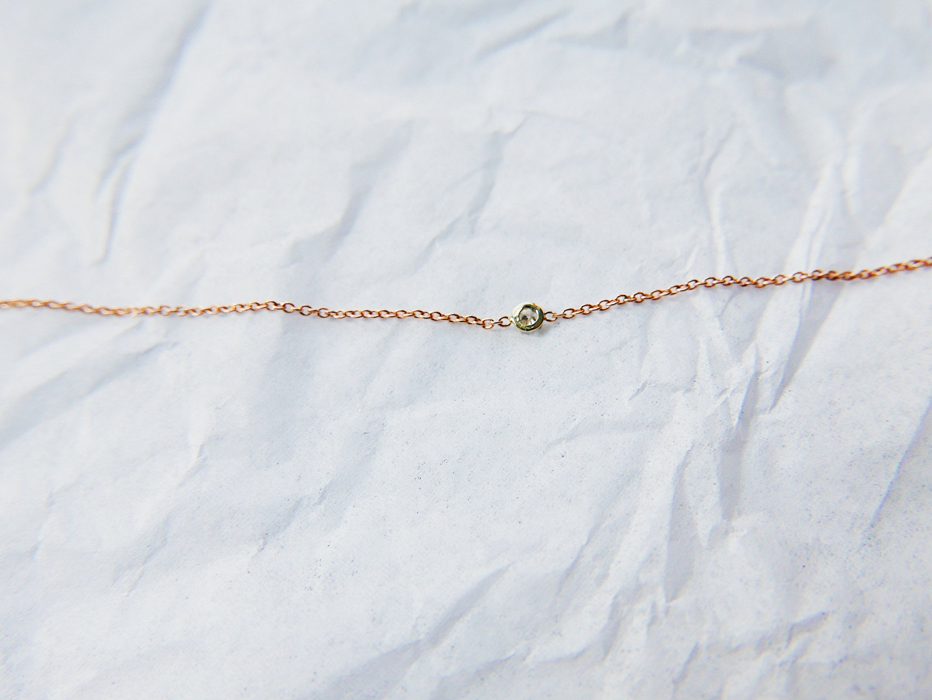 14k single diamond bracelet