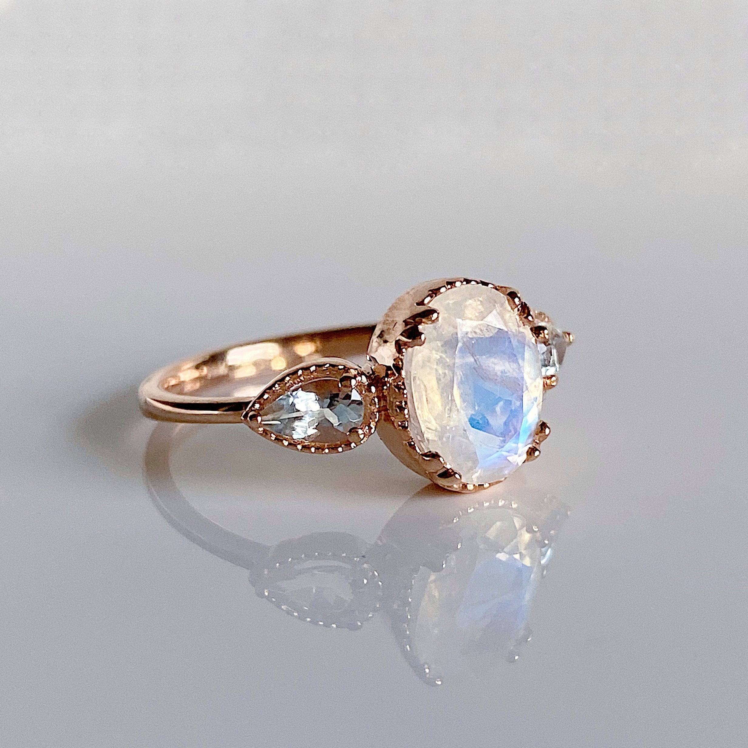 New Dawn Moonstone and Aquamarine ring, Oval Moonstone Ring with Pear aquamarine Side Stones, three stone moonstone ring