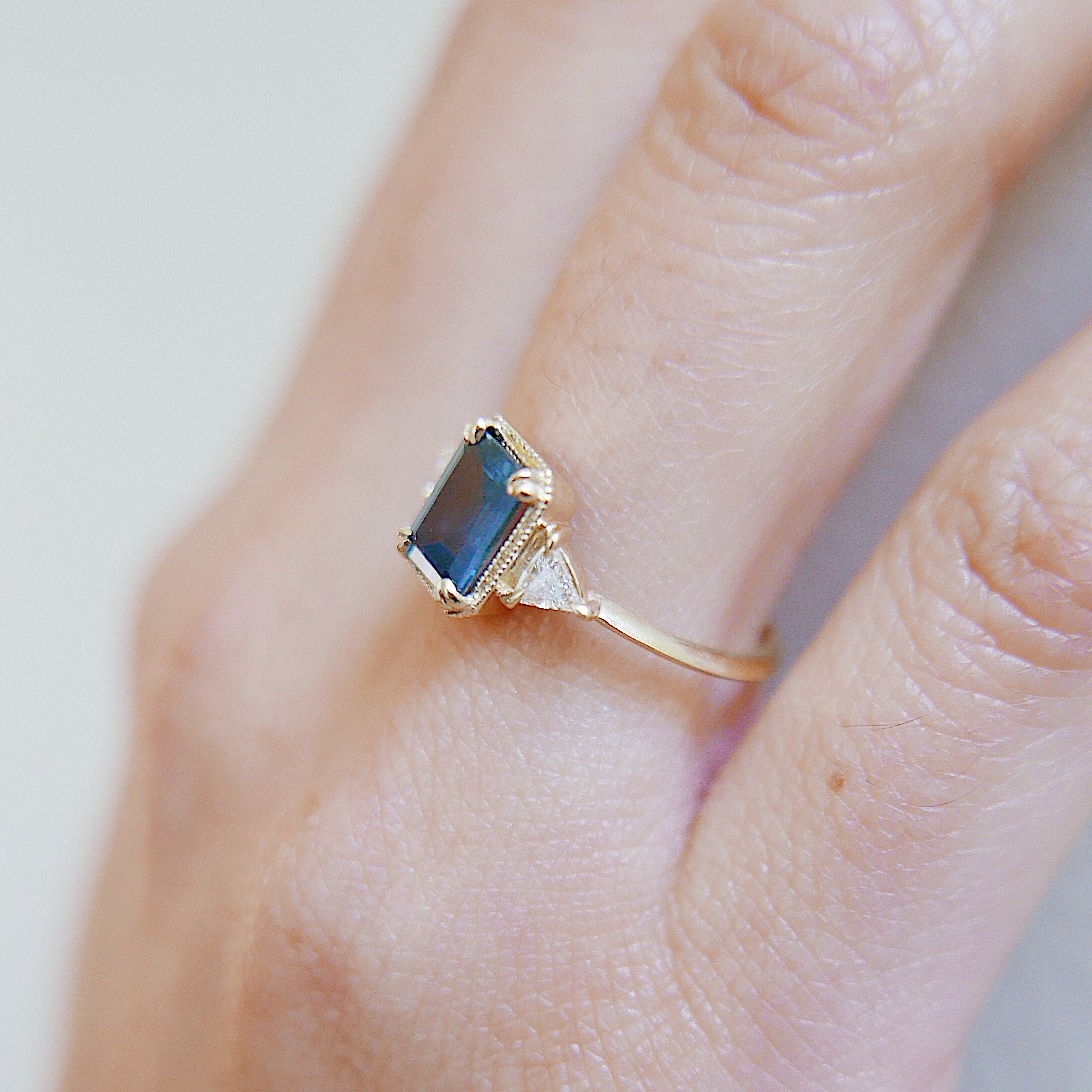 Amelia blue sapphire Ring, 3 stone ring, classic alternative engagement ring, light blue sapphire emerald cut and Diamond trillion ring