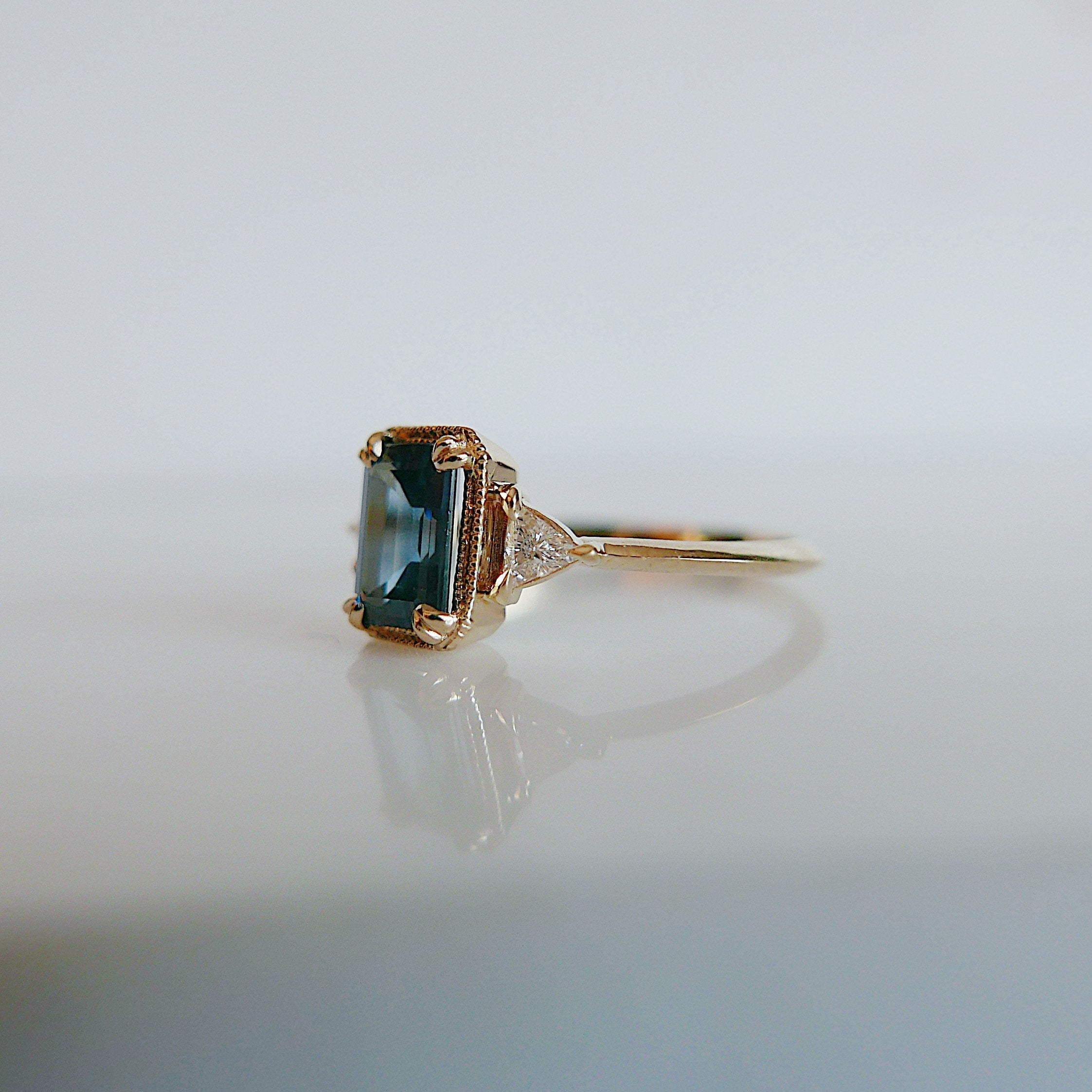 Amelia blue sapphire Ring, 3 stone ring, classic alternative engagement ring, light blue sapphire emerald cut and Diamond trillion ring