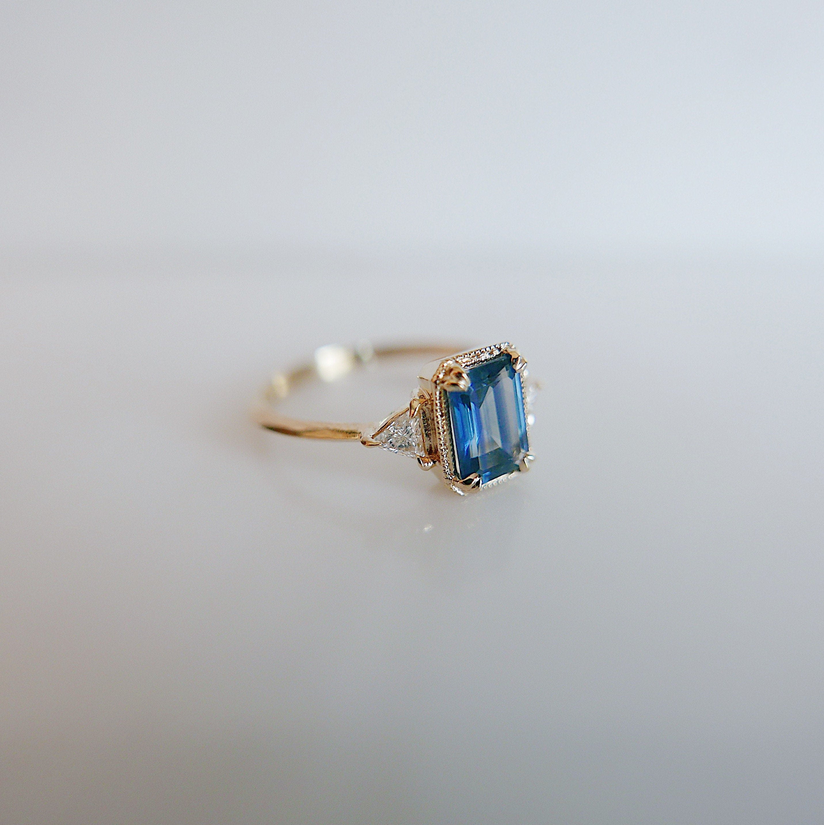 Amelia blue sapphire Ring, 3 stone ring, classic alternative engagement ring, light blue sapphire emerald cut and Diamond trillion ring